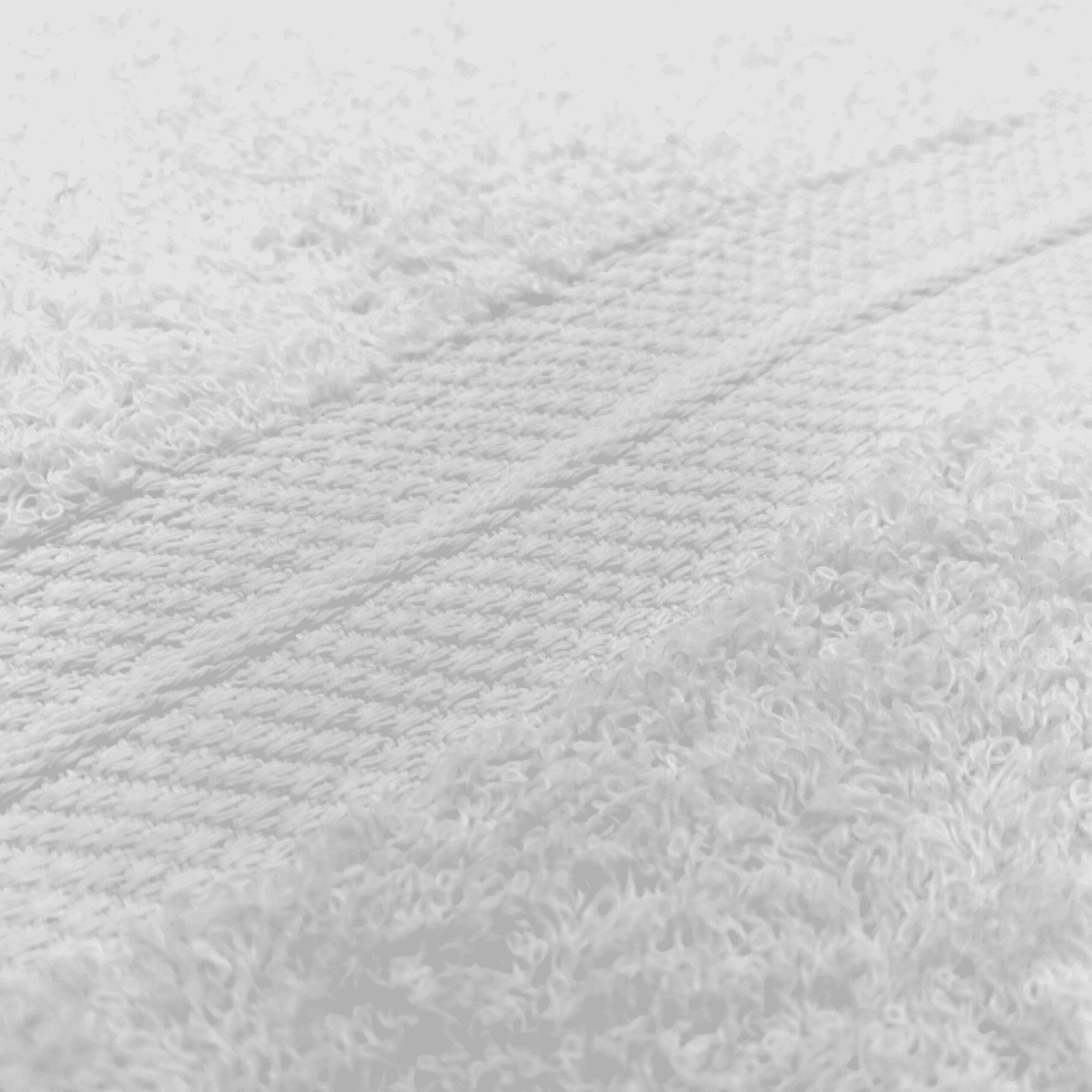 Dettaglio-Telo-da-bagno-bianco-spugna-puro-cotone-100x150cm-tinta-unita-made-in-italy