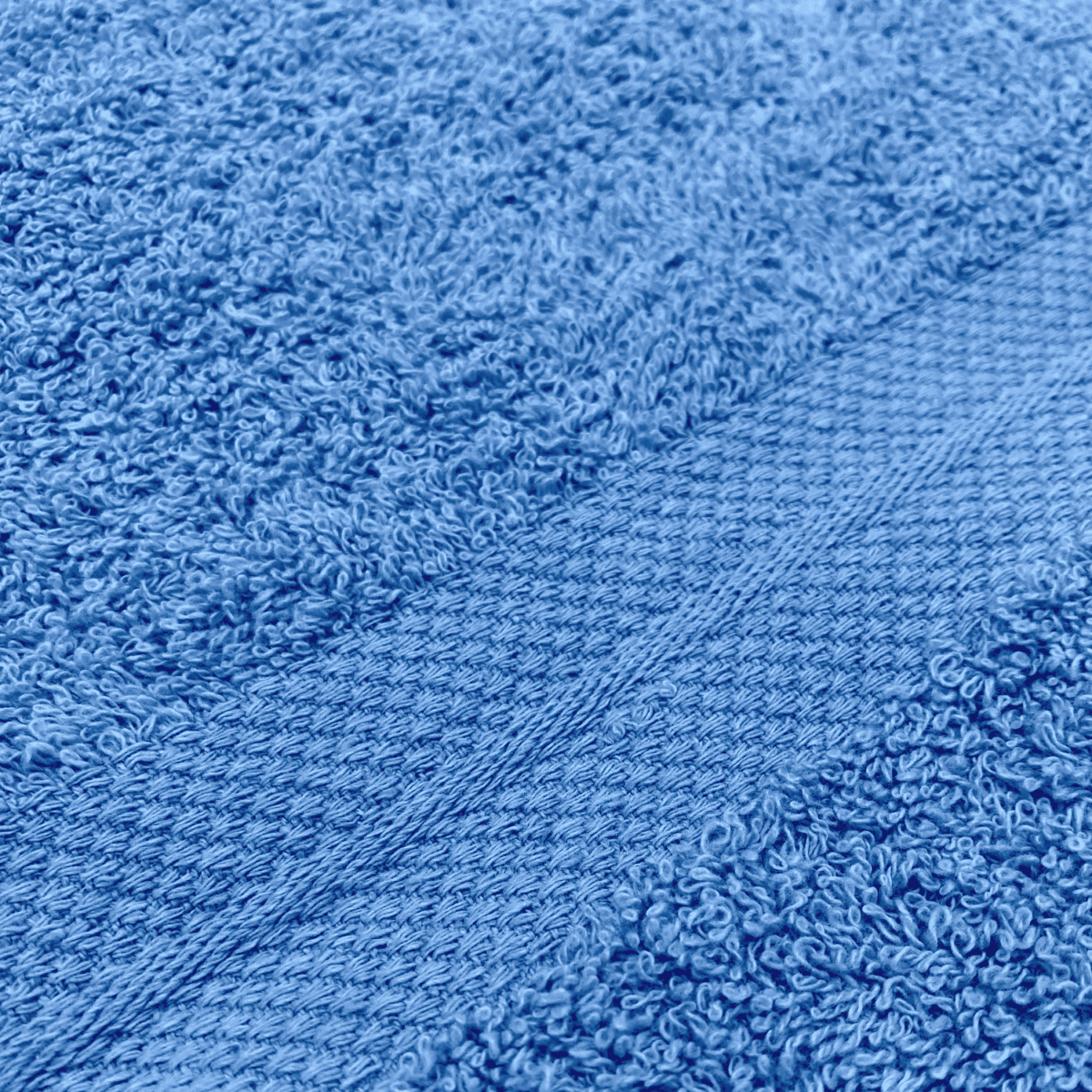Dettaglio-Telo-da-bagno-azzurro-spugna-puro-cotone-100x150cm-tinta-unita-made-in-italy